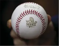  ?? PHOTO/DAVID J. ?? A baseball is seen before Game 5 of baseball’s World Series between the Houston Astros and the Los Angeles Dodgers on Sunday in Houston. AP
PHILLIP