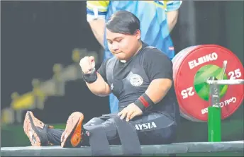  ?? — Bernama file photo ?? Bonnie reacts after a successful attempt during the 2018 Commonweal­th Games.