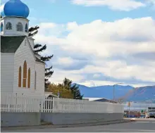  ?? DONALD H. COOLEY, LYNN STEWART, ALASKA DOT&PF, MIKE COPPOCK FOR USA TODAY ?? Top: The Tustumena awaiting departure in Homer. Above, left: The Tustumena pulls into dock in Dutch Harbor during a glorious sunrise. Above: Holy Resurrecti­on Russian Orthodox Cathedral in Kodiak near the ferry terminal.