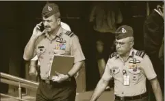  ?? PTI ?? Deputy Chief of Air Staff Air Marshal V R Chaudhari and Air Marshal Anil Khosla (R) leave the Supreme Court after a hearing on the Rafale deal, in New Delhi, Nov 14