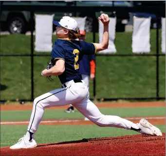  ?? PHOTO BY MARK STOCKWELL — BOSTON HERALD ?? Xaverian High pitcher Pat Rhodes hurls a pitch during a high school baseball game against Walpole High in Westwood Monday.