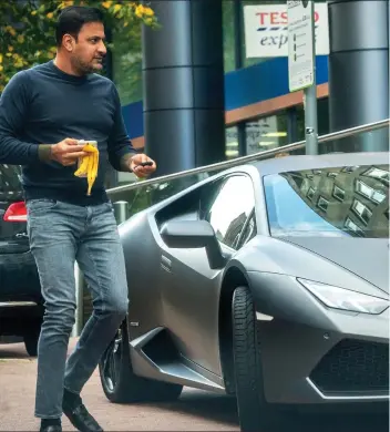  ??  ?? Meals on wheels: Raheel Choudhary with his grey Lamborghin­i. Below: A Range
