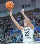  ?? NATHAN J. FISH/THE OKLAHOMAN ?? Seiling’s Kenly Gore shoots a 3-pointer Friday during a Class B girls basketball state semifinal against Okarche at State Fair Arena.