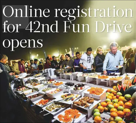  ?? Virendra Saklani/Gulf News Archives ?? Participan­ts enjoy dinner during a previous edition of the Fun Drive. The 2024 Gulf News Fun Drive to be held at Tilal Swaihan on February 10-11 will be in a loop format whereby the start and end of the route will be at the same location.