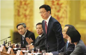  ??  ?? Han attends the news conference following the closing session of the National People’s Congress (NPC), at the Great Hall of the People in Beijing, China. China pledged to press ahead with market opening and reforms while reiteratin­g that it will treat...