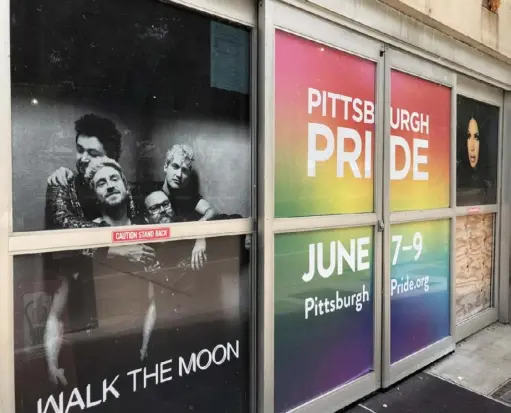  ?? Post-Gazette ?? An advertisem­ent for Pittsburgh Pride's 2019 celebratio­n remains in a Downtown doorway on Fort Duquesne Boulevard. PrideFest 2020 was first reschedule­d from June to July due to the COVID-19 pandemic, and now tentativel­y has moved to fall.