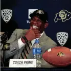  ?? RON CHENOY/USA TODAY SPORTS ?? New Colorado head coach Deion Sanders reacts during his introducti­on Sunday.