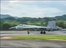  ?? FU GAN / XINHUA ?? A PLA fighter jet prepares to take off during combat exercises on Sunday.