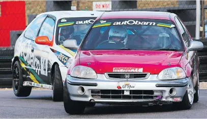  ?? Picture: RacePics ?? CLOSE STUFF. Jonathan du Toit (TAR Honda Civic) and Bret Garland (autObarn Honda Civic) should dice at the head of the autObarn SuperHatch races.