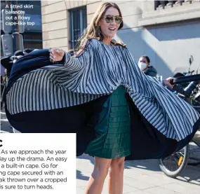 ?? ?? A fitted skirt balances out a flowy cape-like top
