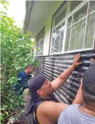  ?? CIVA team putting up shutters before arrived in Tonga. Tropical Cyclone Harold ??