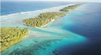  ?? PHOTOS: NICOLE EVATT/THE ASSOCIATED PRESS ?? Coral atolls separate the ocean from the lagoon in the Republic of the Marshall Islands, which is a 41/2-hour flight from Honolulu.