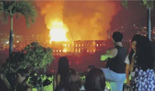  ?? PICTURE: AFP/GETTY IMAGES ?? 0 The night sky is lit up as a massive fire engulfs the National Museum in Rio de Janeiro, one of Brazil’s oldest