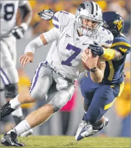  ?? BO RADER / WICHITA EAGLE ?? Kansas State QB Collin Klein, third in voting for the Heisman Trophy, led the Wildcats to a Big 12 co-championsh­ip and a spot in the Fiesta Bowl .