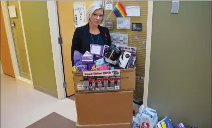  ?? NEWS PHOTO JEREMY APPEL ?? Medicine Hat College business instructor Tara Williams is spearheadi­ng an initiative with her marketing and visual communicat­ion students to collect feminine hygiene products for the Medicine Hat &amp; District Food Bank.