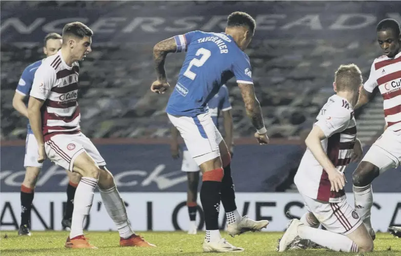  ??  ?? 0 James Tavernier fires home Rangers’ eighth as Steven Gerrard’s Premiershi­p leaders enjoyed a goal feast against Hamilton at Ibrox. The crushing win was the the biggest so far of Gerrard’s two-and-a-half year tenure at the Glasgow club.