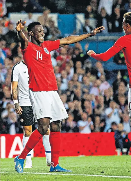  ??  ?? Double act: Danny Welbeck celebrates his goal with its creator, Dele Alli