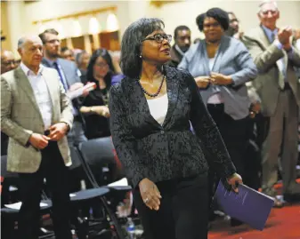  ?? Santiago Mejia / The Chronicle ?? Anita Hill heads to the stage to speak at the Oakland Marriott at an event hosted by Rep. Barbara Lee, D-Oakland, and former Oakland Mayor Elihu Harris.