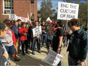  ?? RECORD FILE PHOTO ?? Bryan Johns, with megaphone, one of the organizers of an oCT. 13 protest on the Rensselaer Polytechni­c Institute campus in Troy, speaks to the hundreds who gathered to call on college administra­tors to maintain student control over the Rensselaer Union.