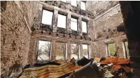  ?? (Zohra Bensemra/Reuters) ?? A SCHOOL DESTROYED during fighting between Russian troops and the Ukrainian army in the recently liberated town of Lyman, Donetsk region, Ukraine.