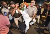  ?? — PTI ?? Youth Congress members stage a protest outside Union home minister Amit Shah’s residence in New Delhi on Friday against removal of SPG security from members of the Gandhi family.