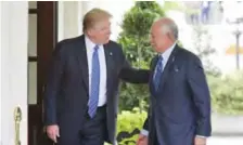  ??  ?? WASHINGTON: US President Donald Trump greets Malaysian Prime Minister Najib Razak outside of the West Wing of the White House in Washington, DC. — AFP