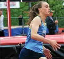  ?? BOB RAINES — DIGITAL FIRST MEDIA ?? North Penn’s Kathleen Stevenson takes the lead in her heat of the 200 meter dash Friday.