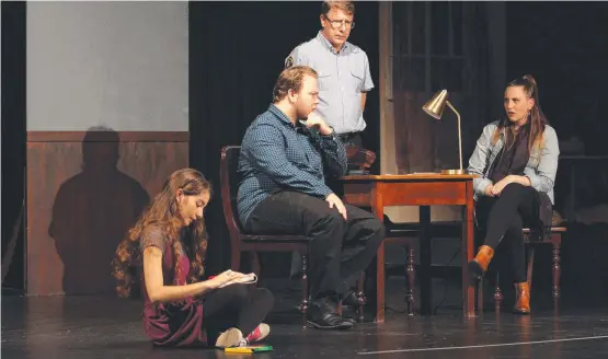  ?? Picture: GARY HARVEY ?? DISTURBING: Lucy Gounaris as Lizzie, Dylan Mcgaw as Lizzie's father, Colin Livesy as the sergeant and Zia Macey as the mother in a scene from Townsville Little Theatre’s production of Wolf Lullaby.