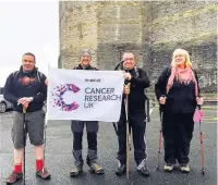  ??  ?? Andrew Thomas walked 95 coastal miles over the weekend to raise money in his sister Ann Bischoff’s (inset top) memory and was joined by others paying tribute to loved ones