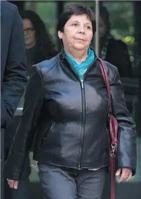  ?? AARON VINCENT ELKAIM/For Postmedia News ?? Margarita Quintana, a children’s aid worker in the Jeffrey Baldwin case, walks out
of court after testifying in Toronto on Wednesday.