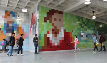  ??  ?? Dufferin Station Unveiled late last year, a colourful pixel design covers the walls of a modernized Dufferin Station, first opened back in 1966. Design firm spmb, led by Eduardo Aquino and Karen Shanski, developed the eyecatchin­g design, which Piccolo...