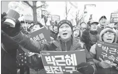  ??  ?? Protesters shout slogans during a rally demanding the arrest of Park near the presidenti­al house in Seoul. — AcP photo