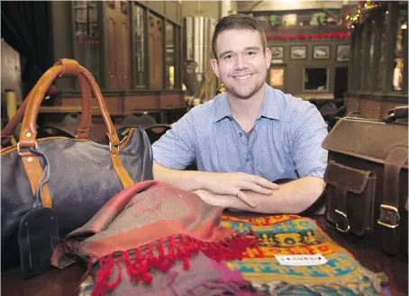  ?? DAX MELMER ?? Dylan Verburg, a University of Windsor student, displays products he imported from India — such as cashmere scarves and buffalo leather handbags — that he’s using to help children pay for school and school supplies in that country.