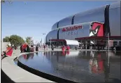  ?? RICK SCUTERI — THE ASSOCIATED PRESS ?? Fans arrive prior to a game between the Arizona Cardinals and the San Francisco 49ers in October of 2019.