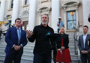  ?? (Nhat V. Meyer/ Bay Area News Group/TNS) ?? Pastor Mike McClure, from Calvary Chapel San Jose, speaks during a news conference outside of Santa Clara Superior Court on Dec. 8, 2020, in downtown San Jose, California.