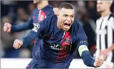  ?? — AFP file photo ?? Mbappe celebrates after scoring during a match.