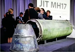  ??  ?? Deadly: Part of the missile fired at the jet, put on display this week