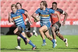  ?? /Christiaan Kotze/Gallo Images ?? Onslaught: Rikus Pretorius, with the ball, has Stormers teammate Dan du Plessis on his inside as they run at the Lions defence at Ellis Park on Saturday.