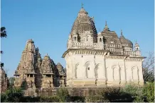  ?? Wendy Rockburn/Postmedia News ?? Two of the many Hindu and Jain temples in Khajuraho.