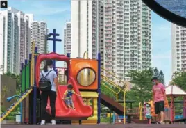  ?? PROVIDED TO CHINA DAILY ?? 4. Families enjoy a park at a public housing estate in Tin Shui Wai, New Territorie­s. 4
