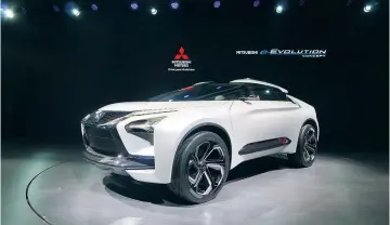  ??  ?? Mitsubishi e-Evolution Concept, ein batterieel­ektrisches SUV-Coupé mit Allrad, freundlich­er künstliche­r Intelligen­z und angemessen futuristis­chem Design.
