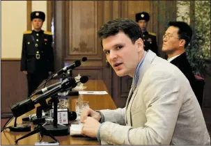  ?? The Associated Press ?? TRAVEL BAN: In this Feb. 29, 2016, photo, American student Otto Warmbier speaks as Warmbier is presented to reporters in Pyongyang, North Korea. U.S. officials say the Trump administra­tion will ban American citizens from traveling to North Korea following the death of Warmbier, who passed away after falling into a coma into a North Korean prison.