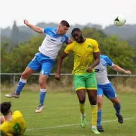  ??  ?? Ross McKernan leaps to score a header but it is disallowed