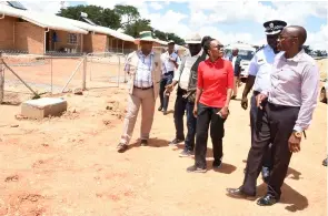  ??  ?? Minister of Defence, Justice and Security Mr Thomas Kagiso Mmusi and his delegation touring the Dukwi Refugee Camp staff houses