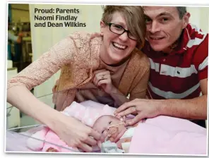  ??  ?? Proud: Parents Naomi Findlay and Dean Wilkins