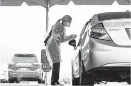  ?? THE NEW YORK TIMES ?? A drive-thru COVID-19 testing site in Hagerstown, Maryland, on Feb. 18. As the omicron coronaviru­s surge subsides, researcher­s are keeping an eye on a highly transmissi­ble subvariant known as BA.2 in Europe and Asia. How big a new wave of U.S. infections might be is unclear, but the White House recently said a host of efforts to control the virus will be forced to stop this spring if Congress doesn’t approve additional funding.