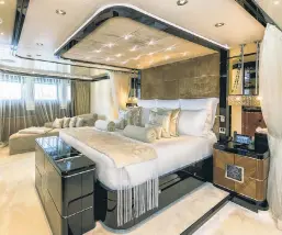  ?? ?? The owner’s suite on the nearly $60 million Talisman C is tricked out with a king-size bed. Invite 13 of your fanciest friends to the slumber party.