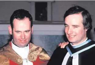  ??  ?? Top: Rev David Armstrong shakes hands with Fr Kevin Mallon. Above: the greeting which sparked controvers­y in 1984