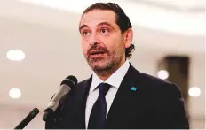  ?? AFP ?? Sa’ad Hariri delivers a statement being designated PM by President Michel Aoun at the presidenti­al palace in Baabda.