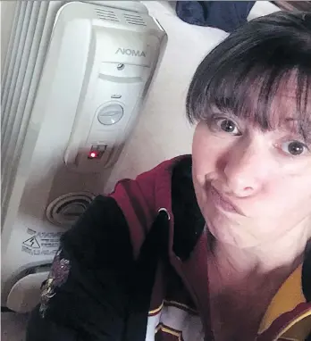  ??  ?? Stephanie Valois of Quesnel says she plans to use her oil heater to keep warm while the natural gas pipeline supplying heat to her home is repaired following a rupture Tuesday near Shelley, north of Prince George.